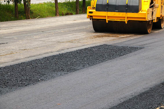 a concrete asphalt under repair